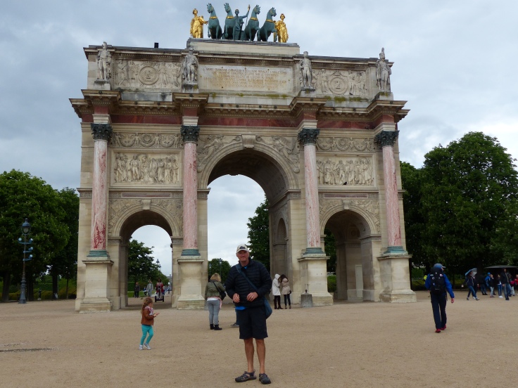 The arch leading into the park in front of The Louvre