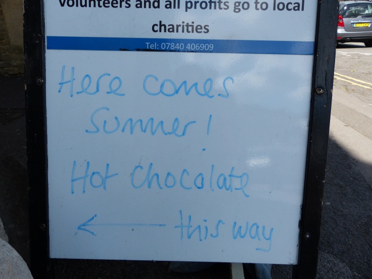 I think this sign outside a cafe says it all about English summer weather! 