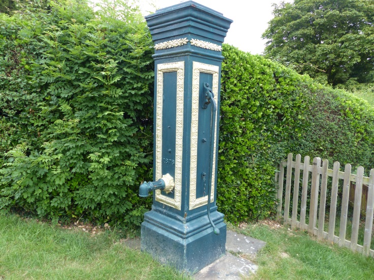 A village water pump in Woodchurch, dating from 1878